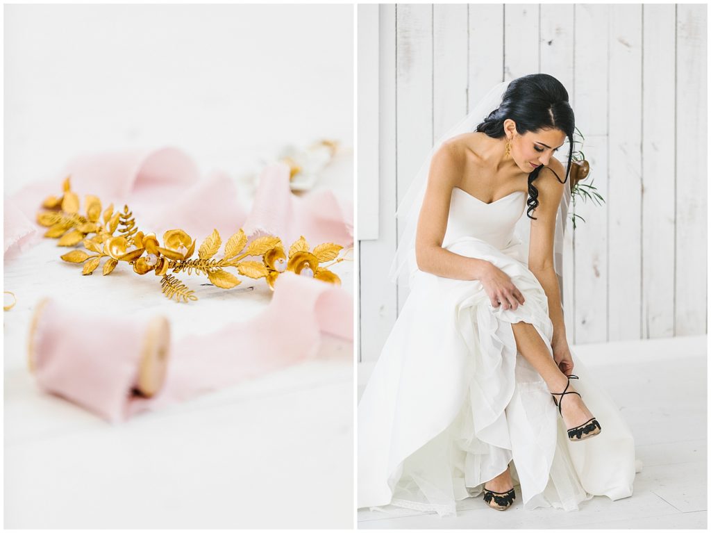 Image of wedding details next to bride putting on her wedding shoes.