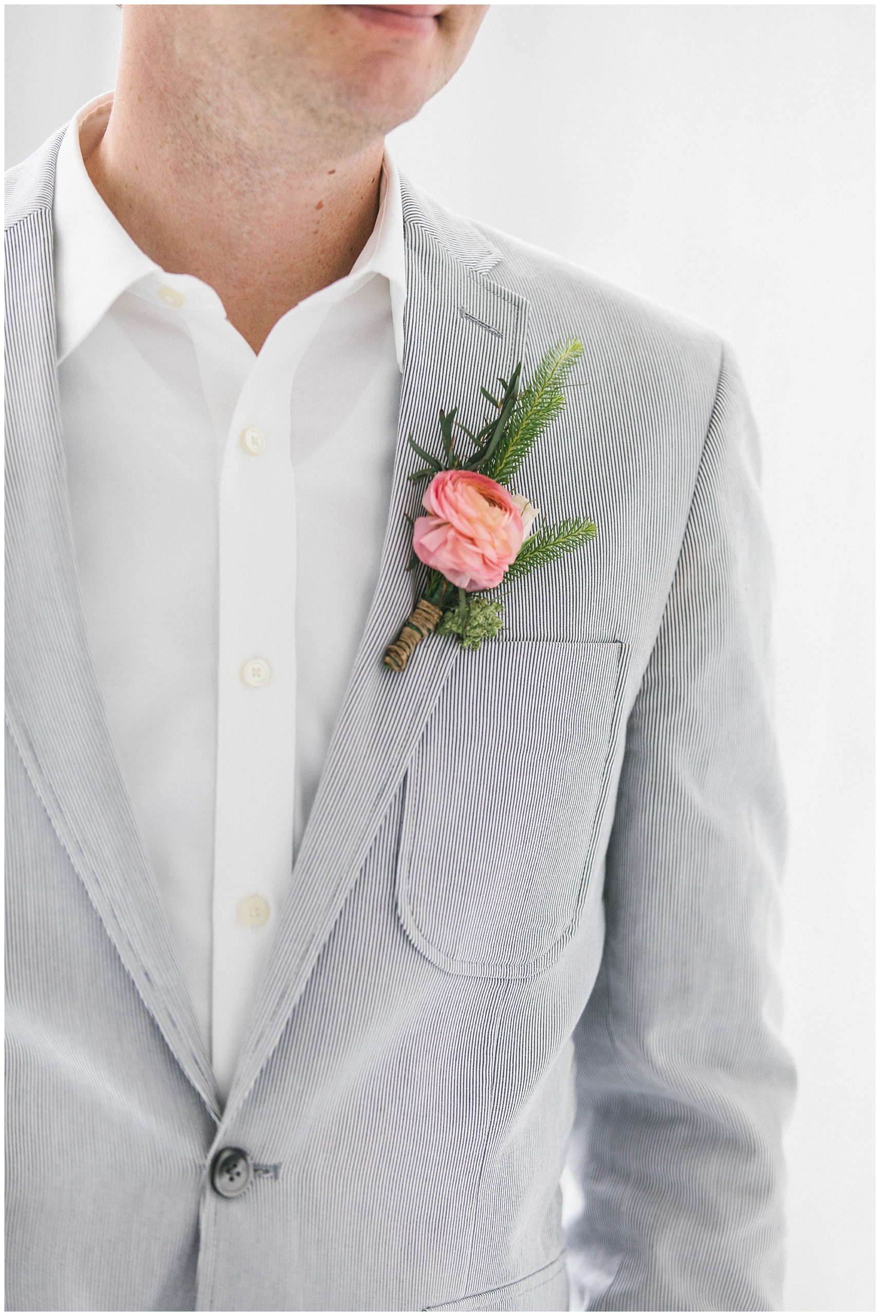 Close up the groom's details.