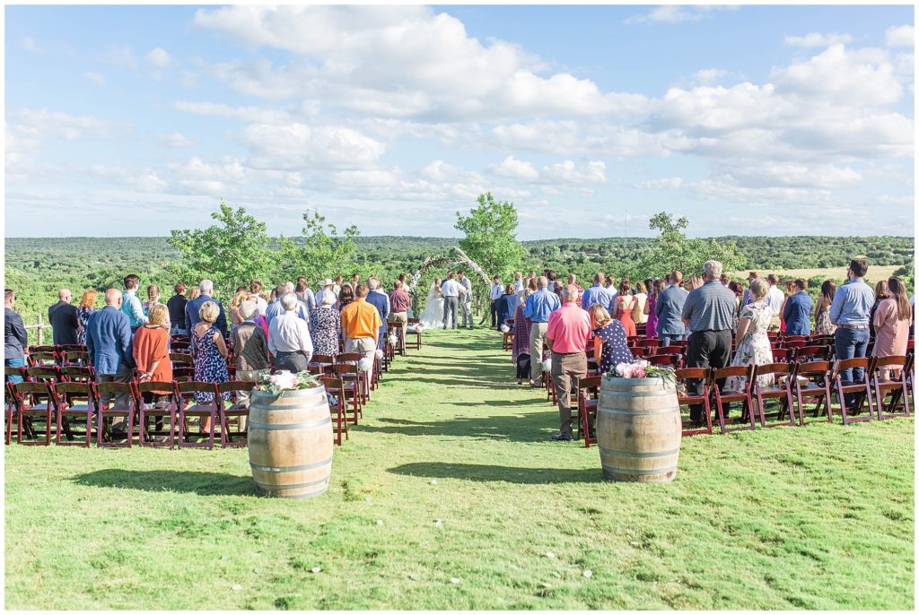a wedding ceremony taking place at Dove Ridge Vineyard