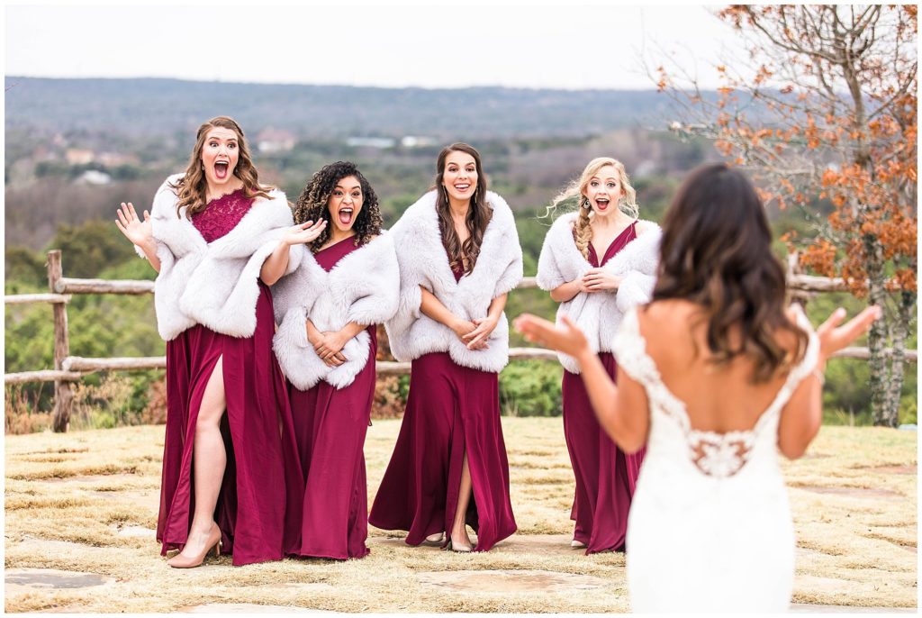 bridesmaids group photo where they see the bride for the first time