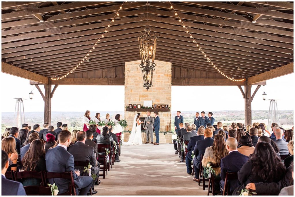 a wedding ceremony taking place indoors at Dove Ridge Vineyard